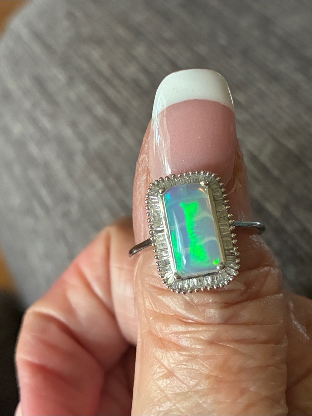 Ethiopian Welo Opal and Diamond Ring in platinum over silver size 8